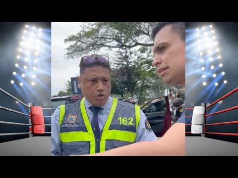 señor Biter se enfrenta a Agente de tránsito en reten