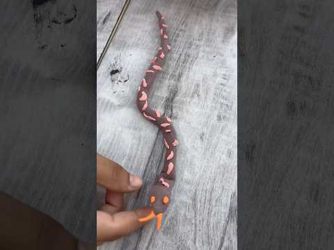 How to make Clay snake 🐍 #viralshort #ytshorts #shortvideo #trendingshorts #clayart #marblemusic