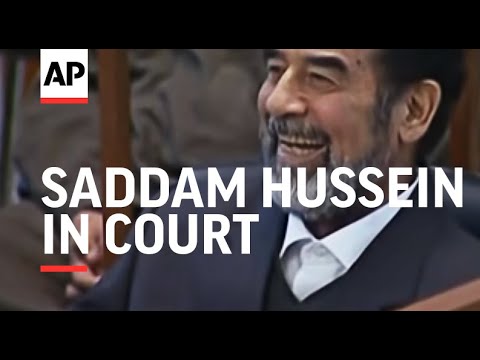 Saddam Hussein in court, says on hunger strike, turbulent scenes