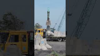 Amazing Excavator moving Tetrapod from Truck #kobelco #excavators #Tetrapod