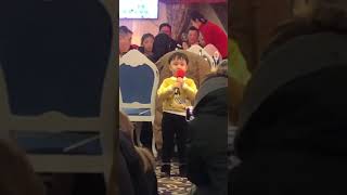 North Korean kid singing on the Rainbow Boat (2), Pyongyang - North Korea NYE 2020