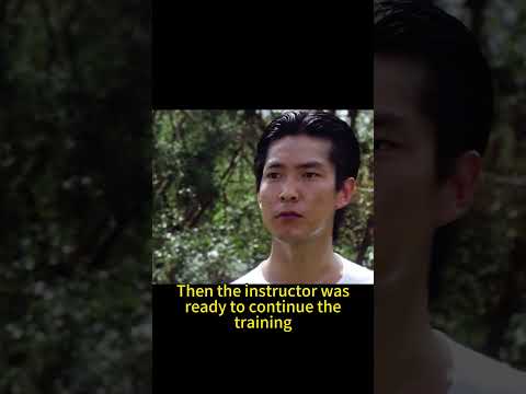 The instructor threw a fake grenade into the distance.