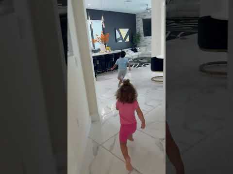 Mom plays โthe floor is lavaโ with son and daughter #shorts