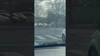 McDonald's Sign Windy Dancing To Irish Music On Car Stereo