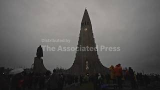 People gather in Reykjavik to see the solar eclipse from Iceland