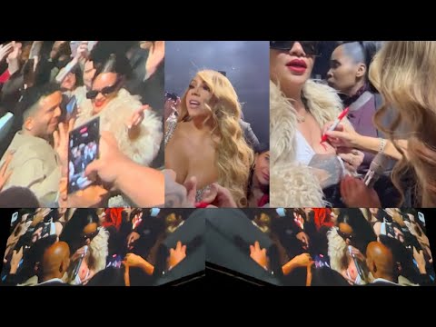 Mariah Carey Autographs Rihanna Boob at NYC Christmas Concert