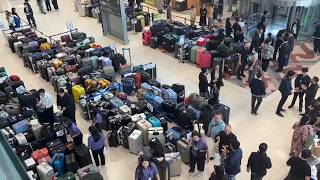 YouTube video thumbnail: Massive Luggage Backlog at Bangkok's Main Airport Following Severe Flooding