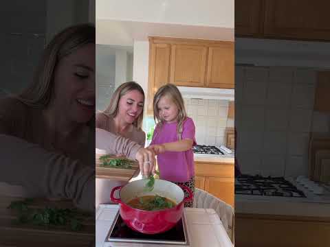 Mom-and-daughter cooking Delicious tomato basil soup made with the greens I grew myself.