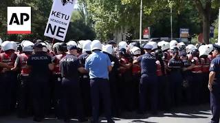 YouTube video thumbnail: Albania Police Hold Back Crowd Protesting a Resort Linked to Jared Kushner