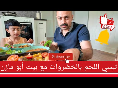 عراقي يأكل بشراهة صينية لحم مشويه بالخضروات مع البرغل الاحمر