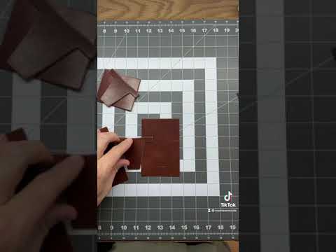 Hand making a leather wallet in 1 minute