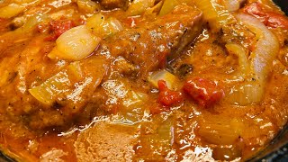Tomato Gravy Smothered Pork Chops 