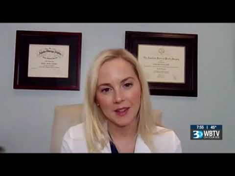 Female professional discussing a topic on video call.