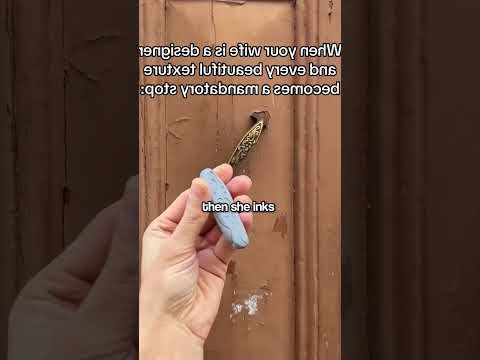 Why Is She Pressing Clay On Ancient Walls? ๐