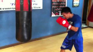 Ronald Pontillas Hitting the Bag