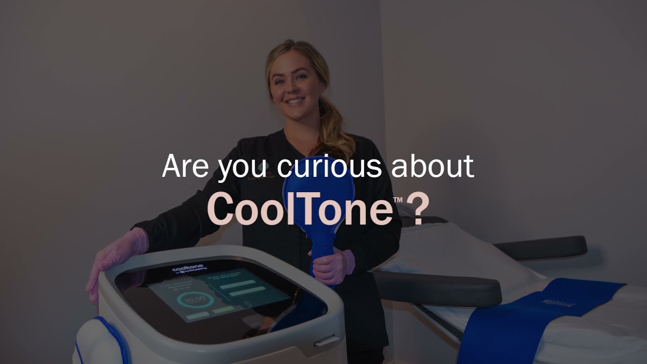 Woman demonstrating CoolTone treatment machine.