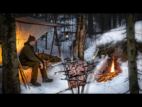 Spring Camping in Snow - Bed from Sacks & Poles - Meat on a Wooden Grill