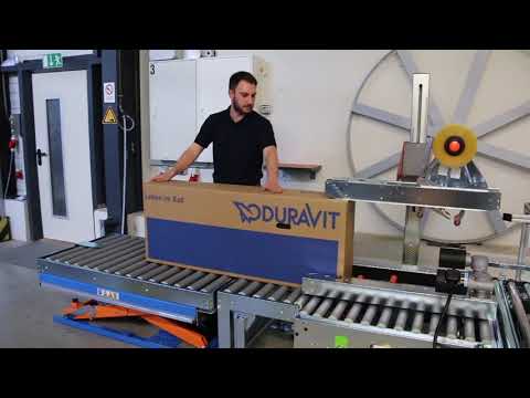 Packplatz mit Hubtisch, Kippstation und Schlauchheber