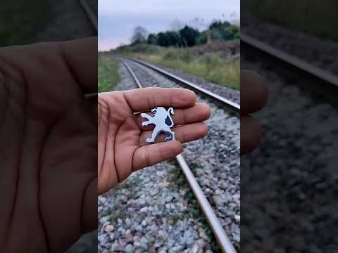 ? Train vs Peugeot logo ??
