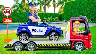 Oliver Tow Truck Driver and Police Officer