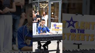 He plays the piano and the harmonica and sings all at the same time!