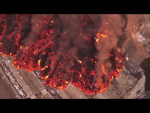 Molten Lava Engulfs Parking Lot in Fiery Flow