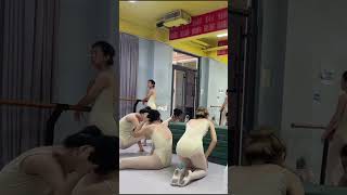 Students doing dance flexibility training
