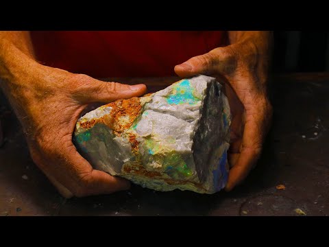HUGE! 11,000 carat uncut gem opal gets carved to expose the top quality colors inside