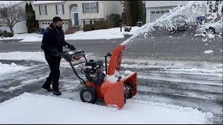 Snow blowing with gas powered snow blower