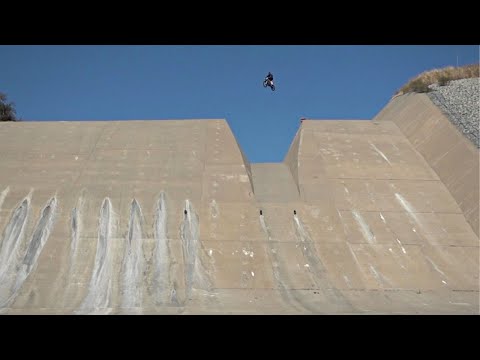 114 Foot Dam jump on a dirtbike. Massive Air