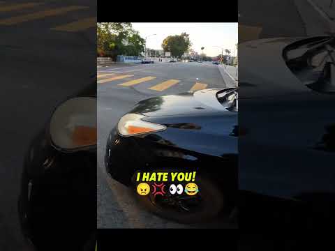 Pruis driver purposely blocking me while lane splitting.