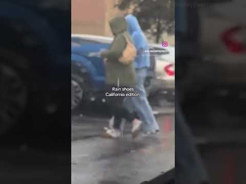 Only in LA… sandals = rain gear 😭😂