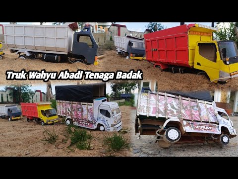 Truk Wahyu Abadi Tenaga Badak Bantu Derek 2 dump Truk terjebak di pasir