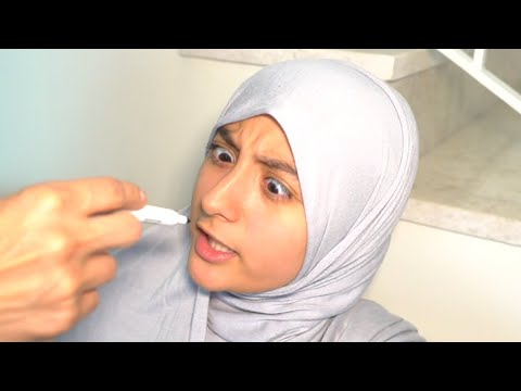 What did he draw on her face!?
