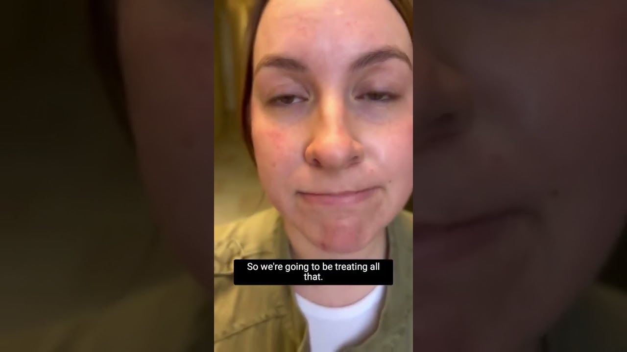 Person discussing treatment options for skin issues.