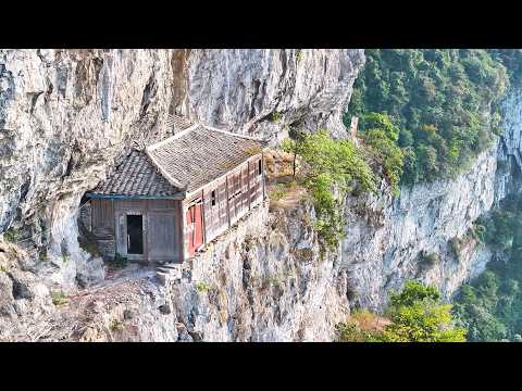 贵州大山上发现一房子，竟巧妙的立于悬崖峭壁之中，太惊险了｜A house on a mountain in Guizhou is built on a cliff. It's so dangerous