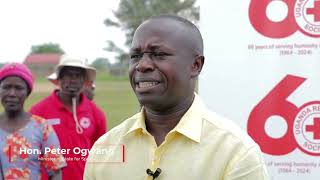 URCS, with support from OPM, distributes NFIs to families affected by floods in Katakwi.