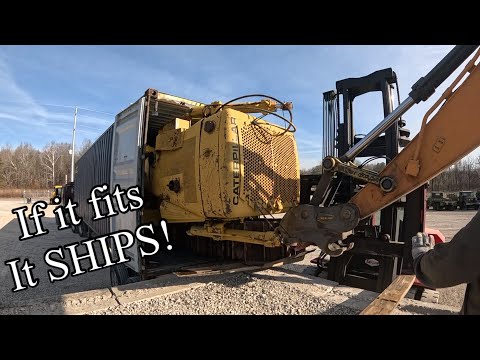 Loading 2 ex army Caterpillar D7F dozers into shipping containers for a long ride to Africa