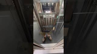 Schindler freight-lift with rare QKS9 glass doors.
