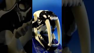 Sabertooth skull carved from 8 Ball
