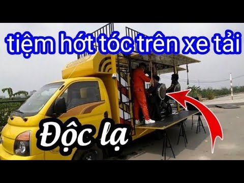 Độc lạ tiệm hớt tóc trên xe tải hè phố Sài Gòn