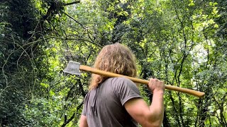 Chopping through a dead tree 