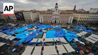 YouTube video thumbnail: Spain Housing Protesters Pack Madrid Square Demanding Protection for Tenants