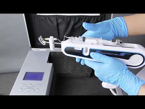 Person holding a skin therapy device in gloves.