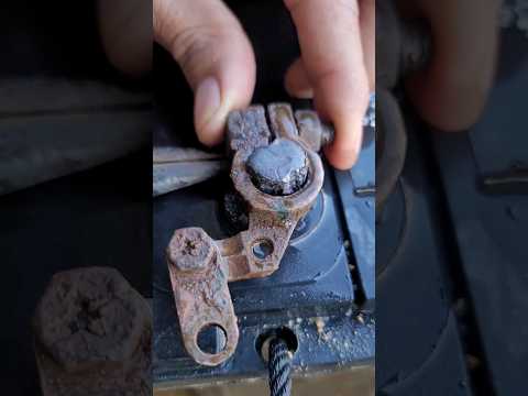 The damaged battery head is repaired.