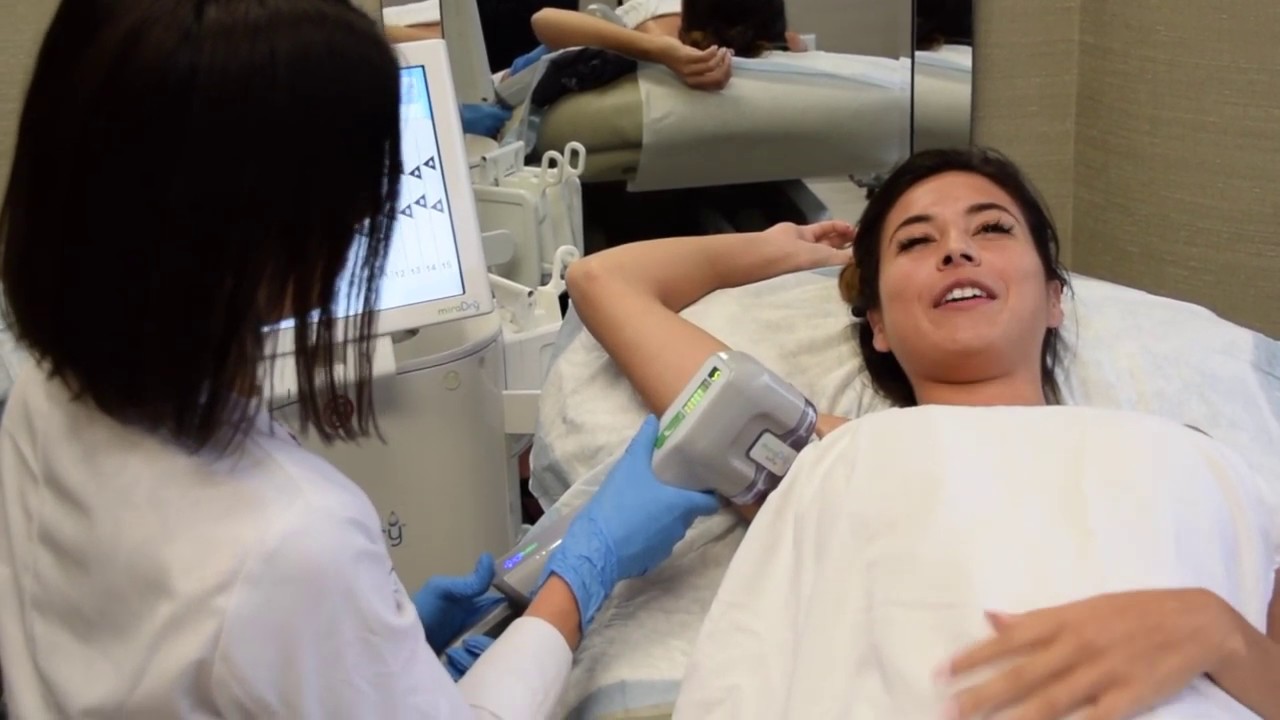 Woman receiving treatment at a medical facility.