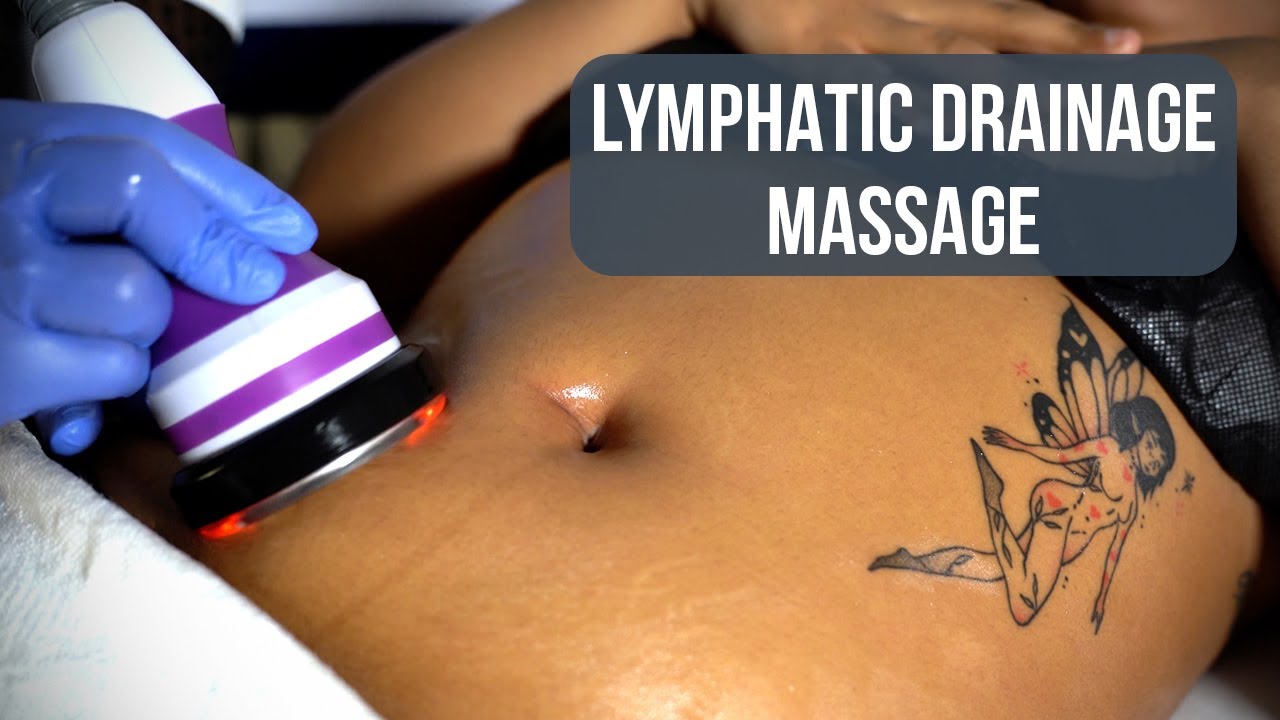 Lymphatic drainage massage in progress on abdomen.
