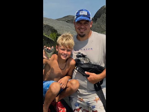 Father and son find megalodon tooth at New Jersey beach