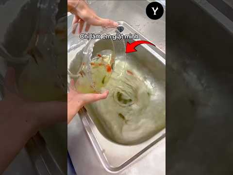 this girl throw fishes in the sink