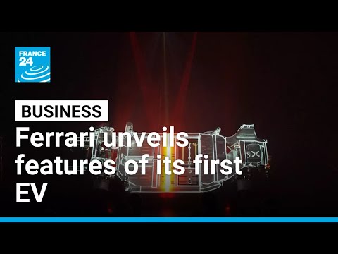 Ferrari unveils chassis of its first electric car, but shares plunge as financial outlook...